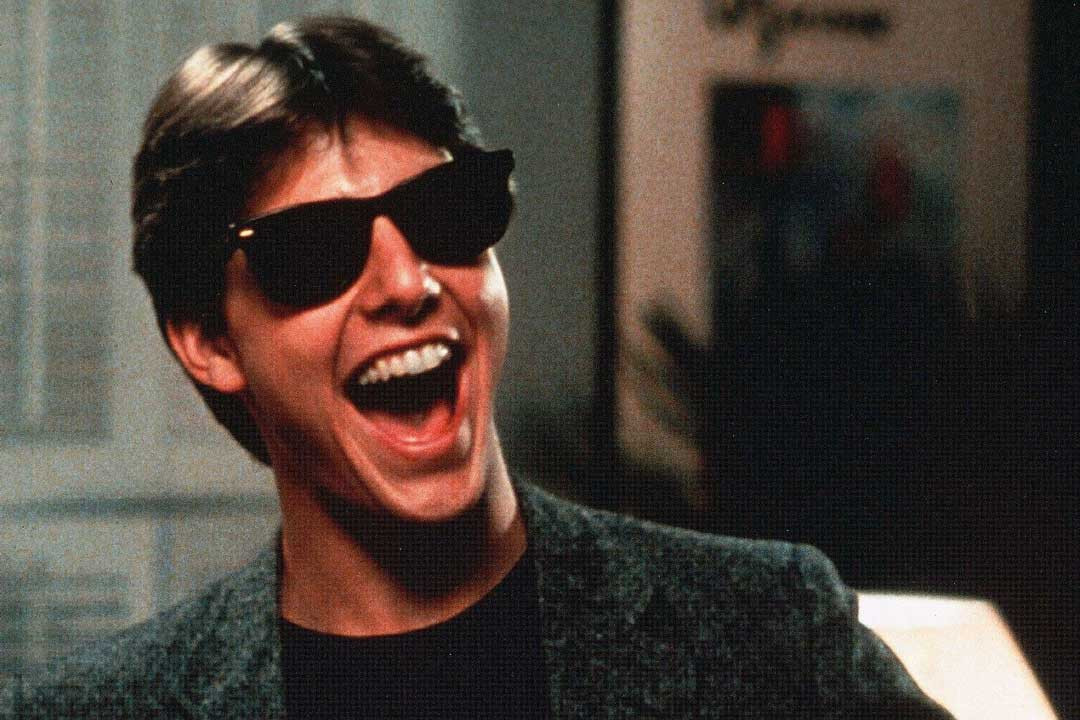 Tom Cruise wearing 80s style RayBan Wayfarer sunglasses in Risky Business