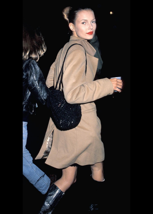 Kate Moss wearing a beige winter coat