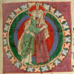 Couple embraising. They both wear long tunics, hers with wider sleeves than his. They both wear a long shirt/cote under it. Hers has long sleeves, while his doesn’t. 1097
