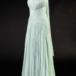 Princess Diana's early style featuring a pastel dress with ruffles, epitomizing her "Shy Di" phase
