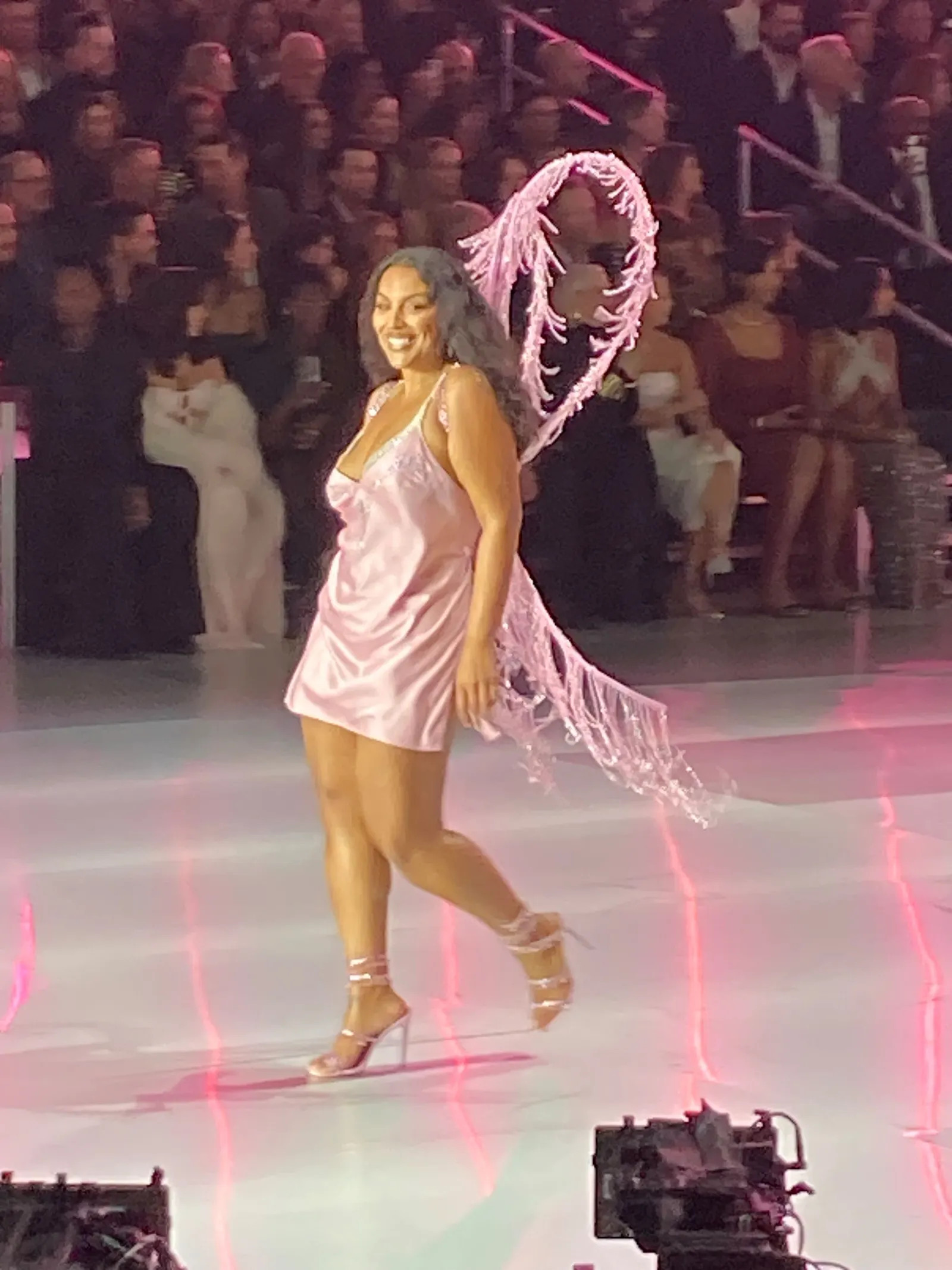 Model Paloma Elsesser showcases inclusivity on the runway, promoting body positivity at the Victoria's Secret Fashion Show 2024.